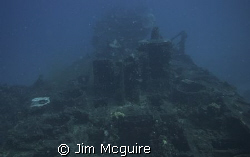 The left side of this wreck off Shell Island in the Kwaja... by Jim Mcguire 